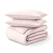 Folded and stacked organic cotton sateen duvet cover