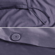 Close-up of a sateen duvet cover with a button and ties