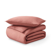Folded and stacked organic cotton sateen duvet cover
