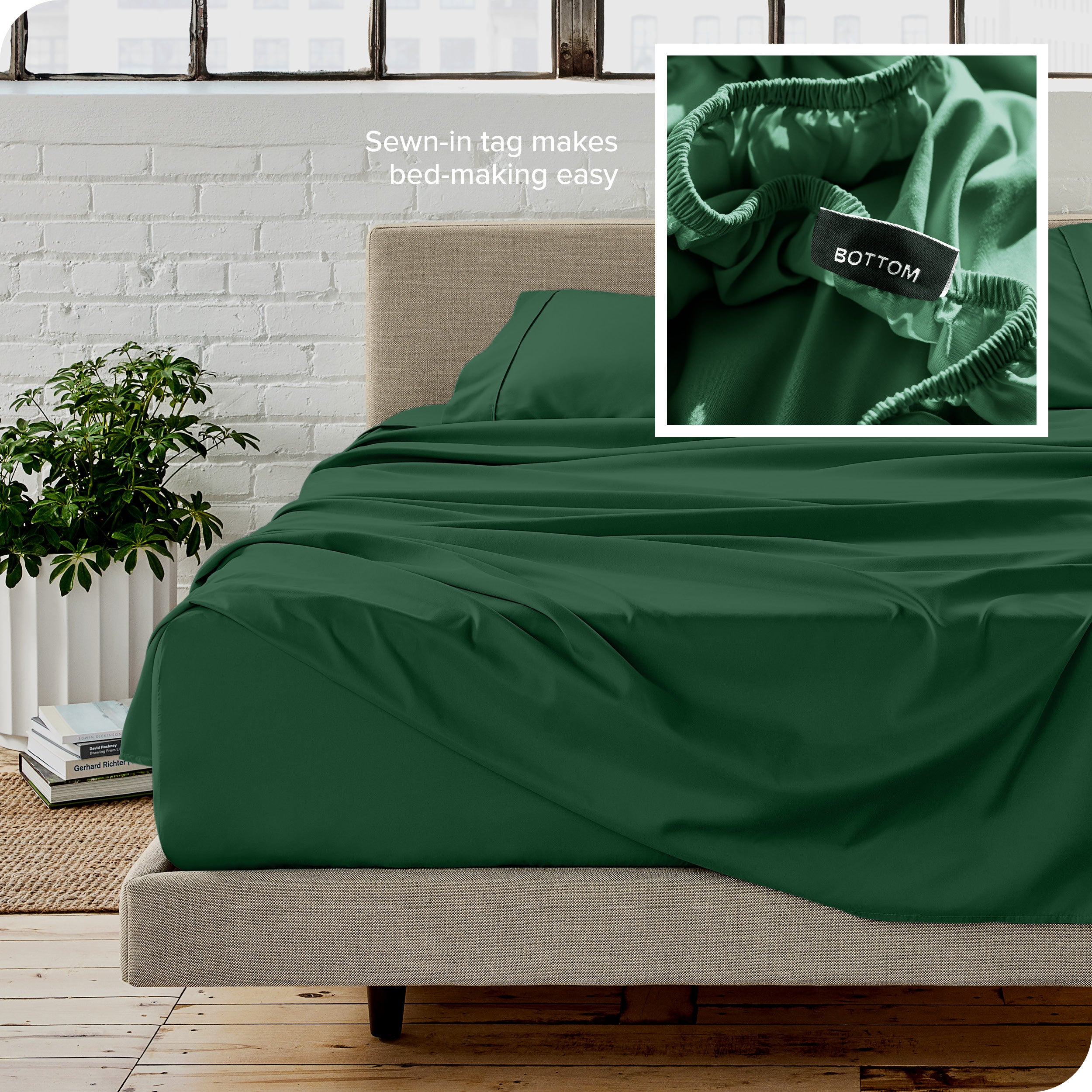 Close up of sewn in tag and matching sheets on a bed