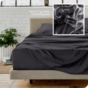 Close up of sewn in tag and matching sheets on a bed