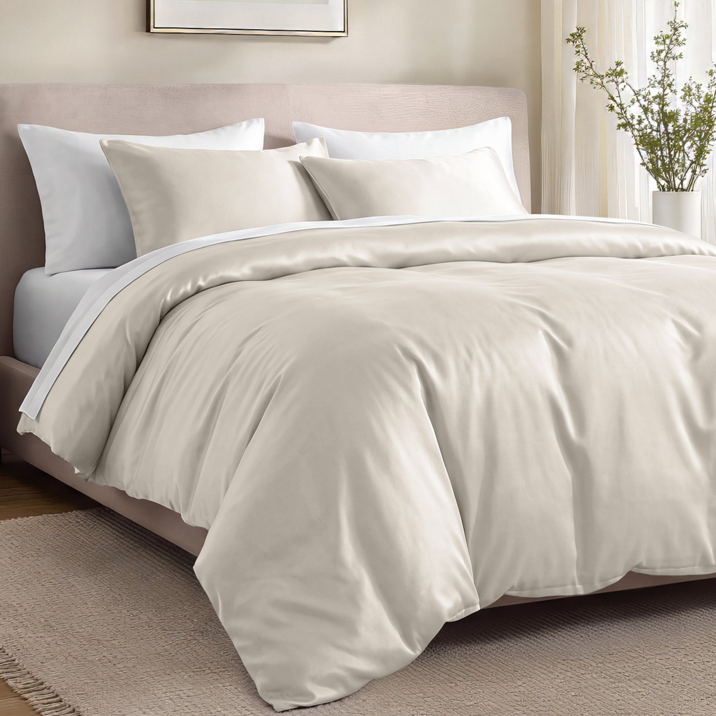 Bed with organic cotton sateen bedding in a bedroom setting.