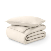 Folded and stacked organic cotton sateen duvet cover