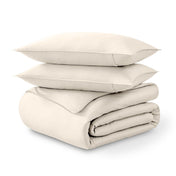 Folded and stacked organic cotton sateen duvet cover