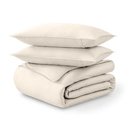 Folded and stacked organic cotton sateen duvet cover