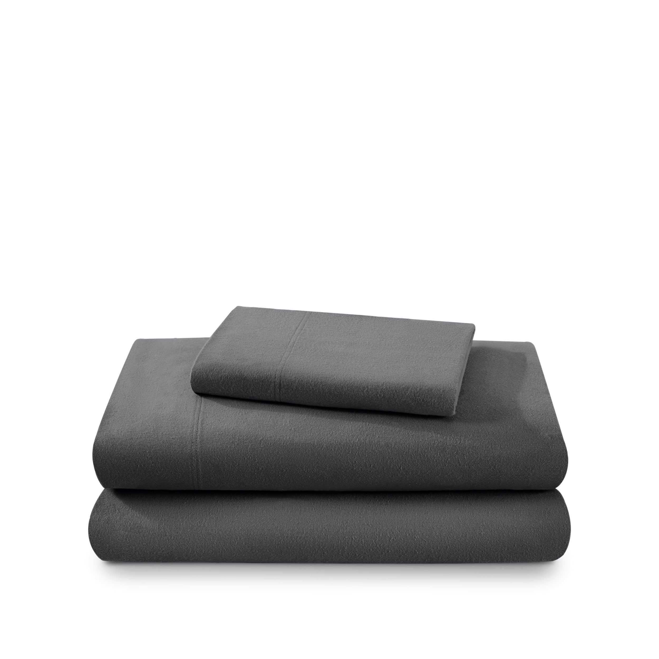 Flannel sheets and pillowcases folded and stacked