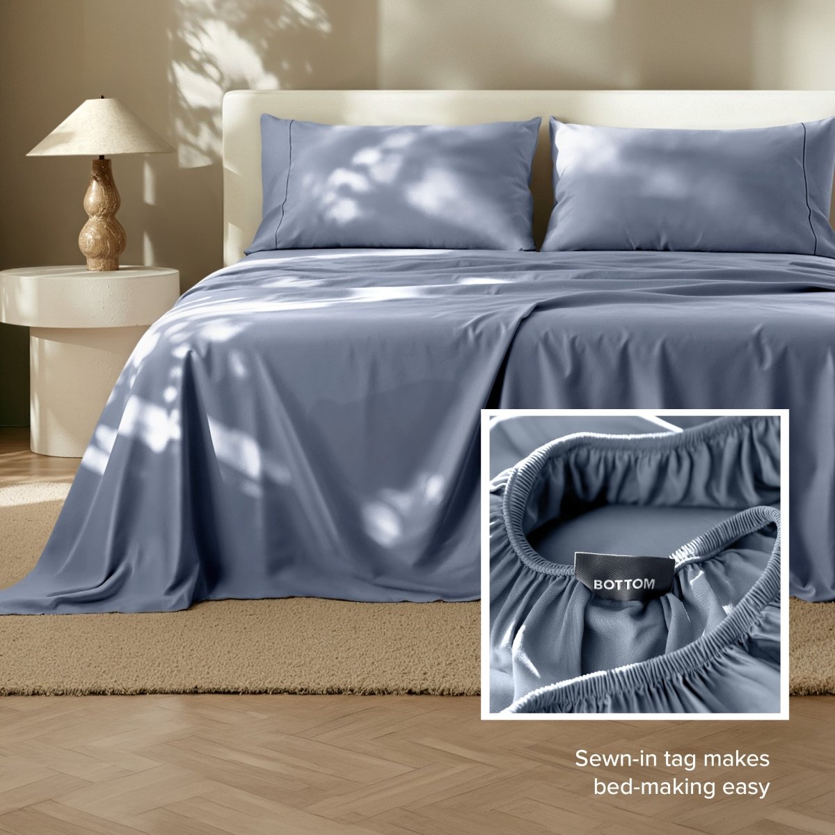 Sheets on a bed with a close-up of the fitted sheet showing a sewn-in tag.