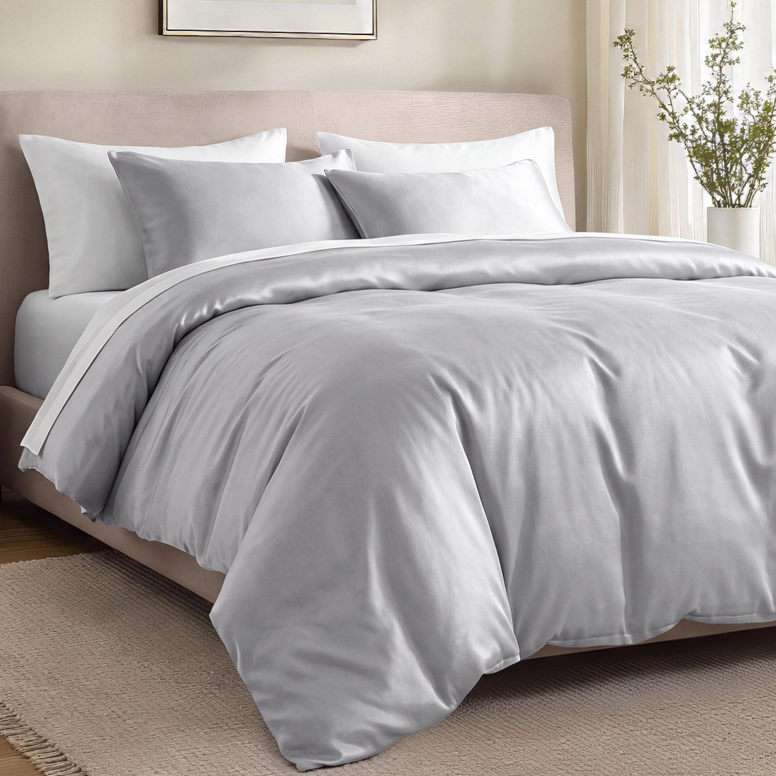 Bed with organic cotton sateen bedding in a bedroom setting.