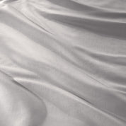 Close-up of sateen fabric with visible texture