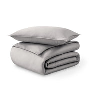 Folded and stacked organic cotton sateen duvet cover