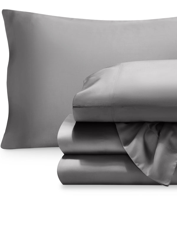 Tencel sheet set folded with the pillowcases on pillows
