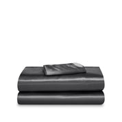 Satin sheet set folded and stacked neatly