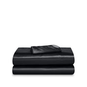 Satin sheet set folded and stacked neatly