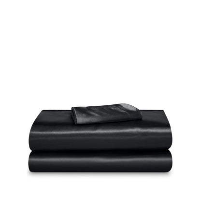 Satin sheet set folded and stacked neatly