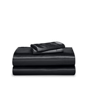 Satin sheet set folded and stacked neatly