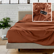 Close up of sewn in tag and matching sheets on a bed