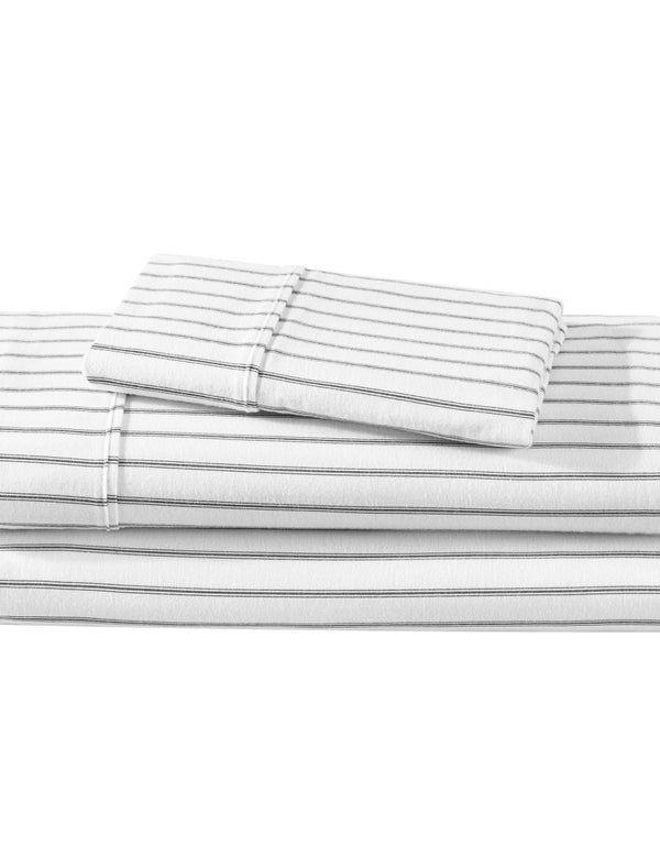 Flannel sheets and pillowcases folded and stacked