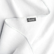 Up close image flannel receiving blanket showing tag