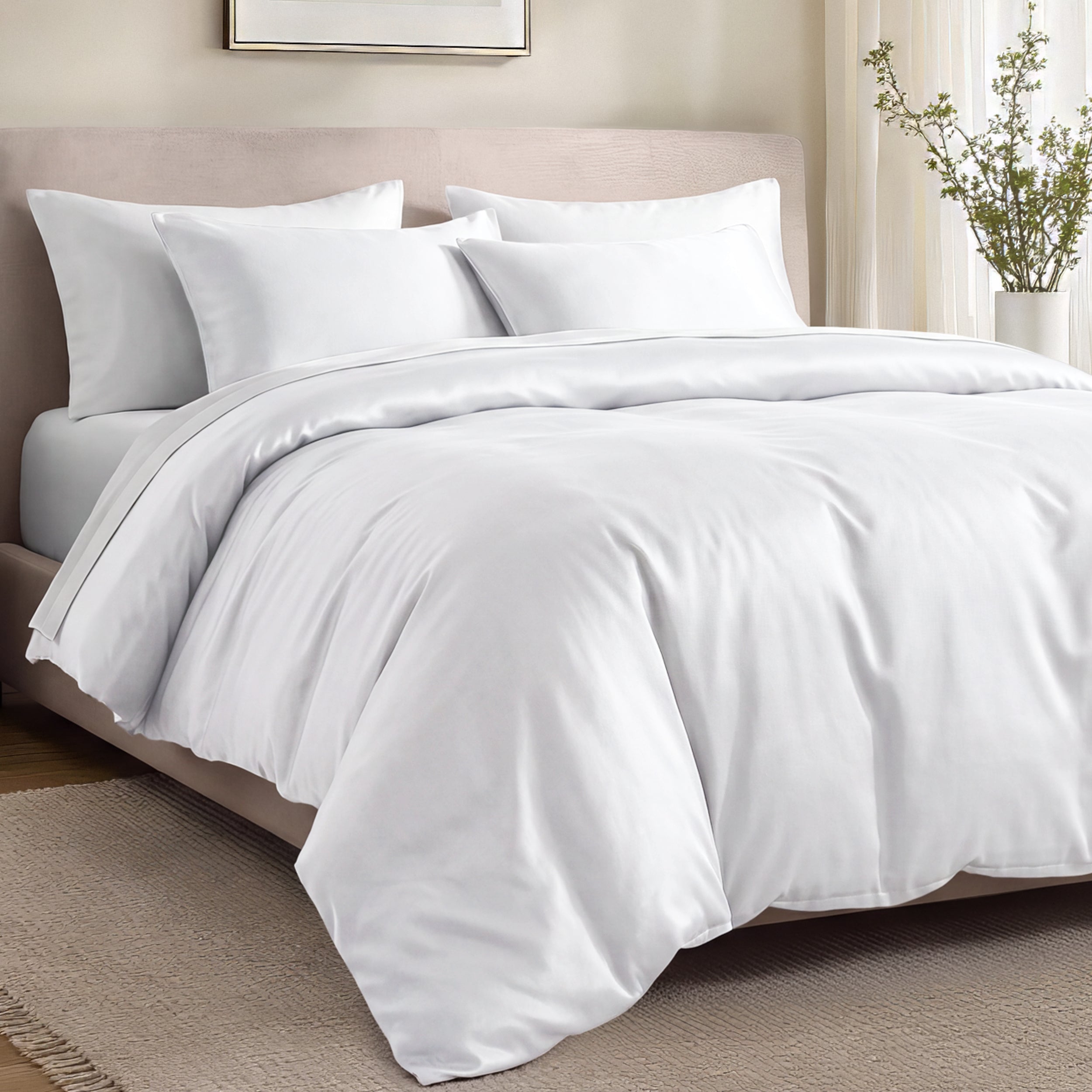 Bed with organic cotton sateen bedding in a bedroom setting.