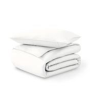 Folded and stacked organic cotton sateen duvet cover
