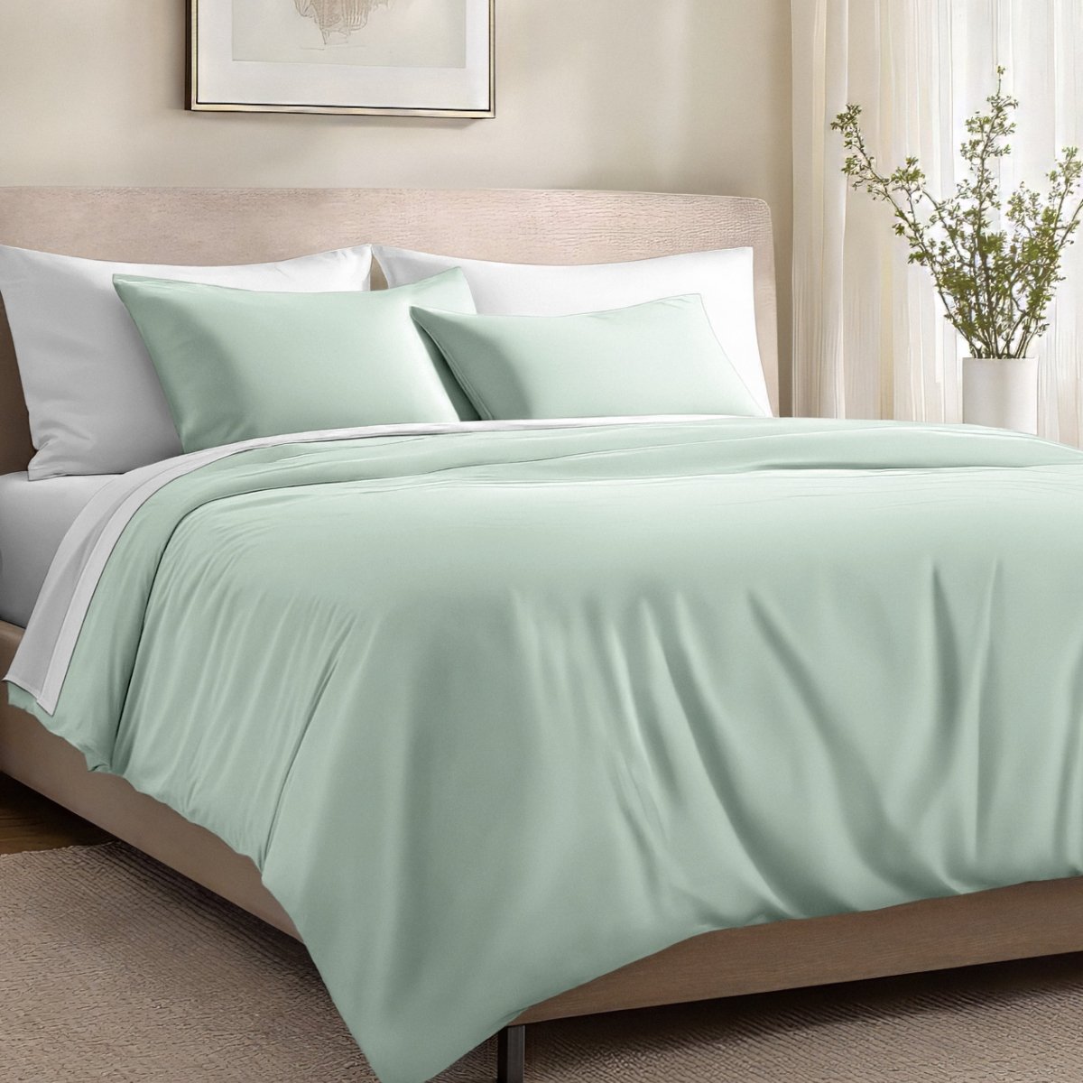 Bed with organic cotton sateen bedding in a bedroom setting.
