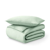 Folded and stacked organic cotton sateen duvet cover