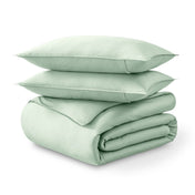 Folded and stacked organic cotton sateen duvet cover