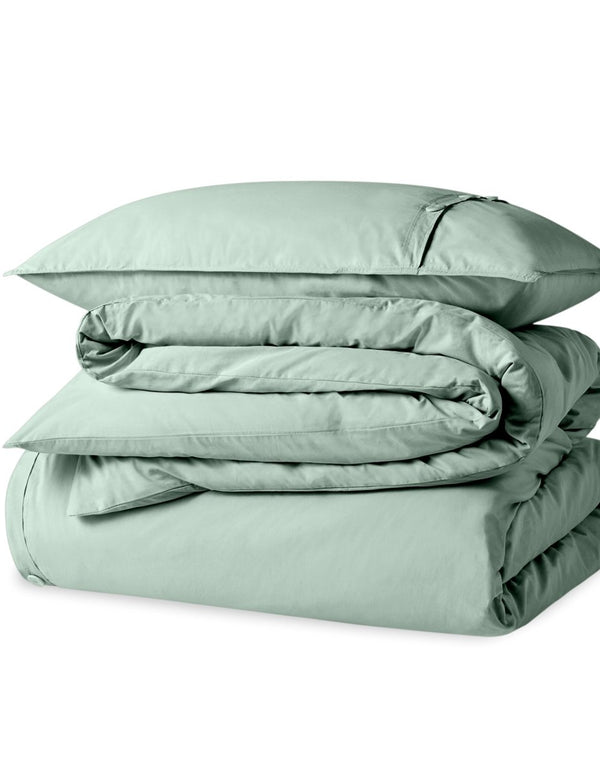 A percale duvet set folded and stacked