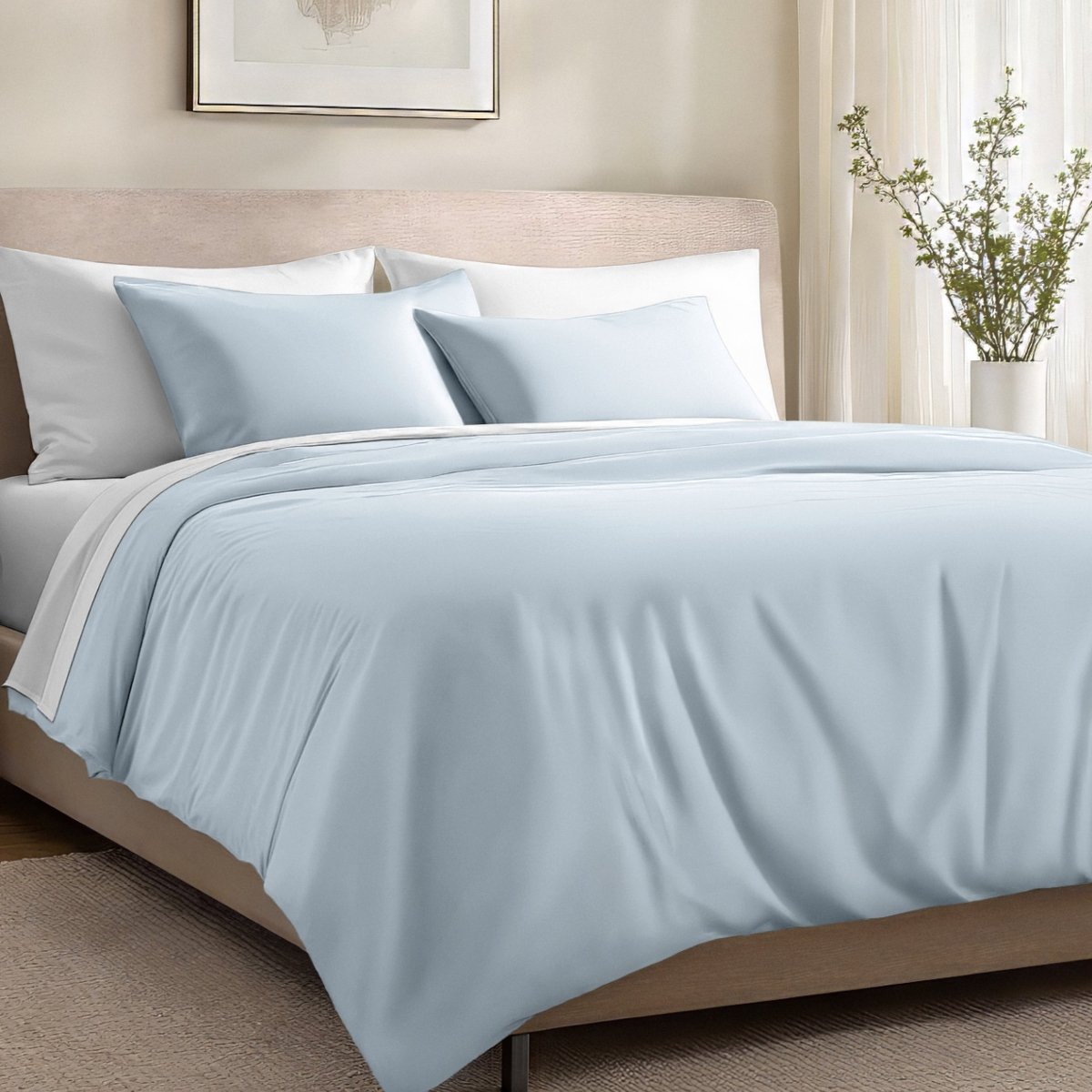 Bed with organic cotton sateen bedding in a bedroom setting.