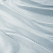Close-up of sateen fabric with visible texture