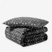 Winter alpine print duvet cover and sham set folded and stacked