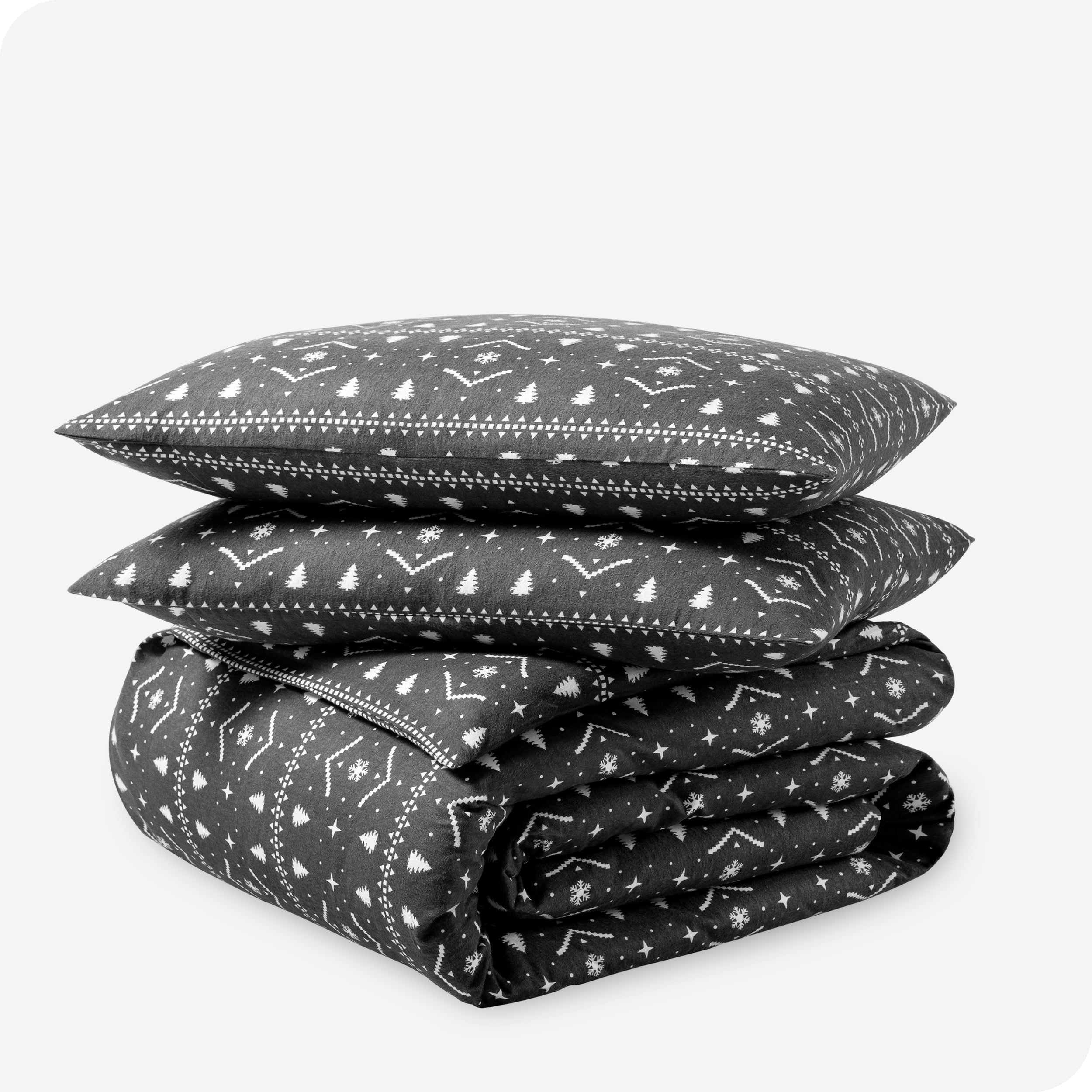 Winter alpine print duvet cover and sham set folded and stacked