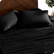 Close up of bamboo sheets and pillowcases on a bed