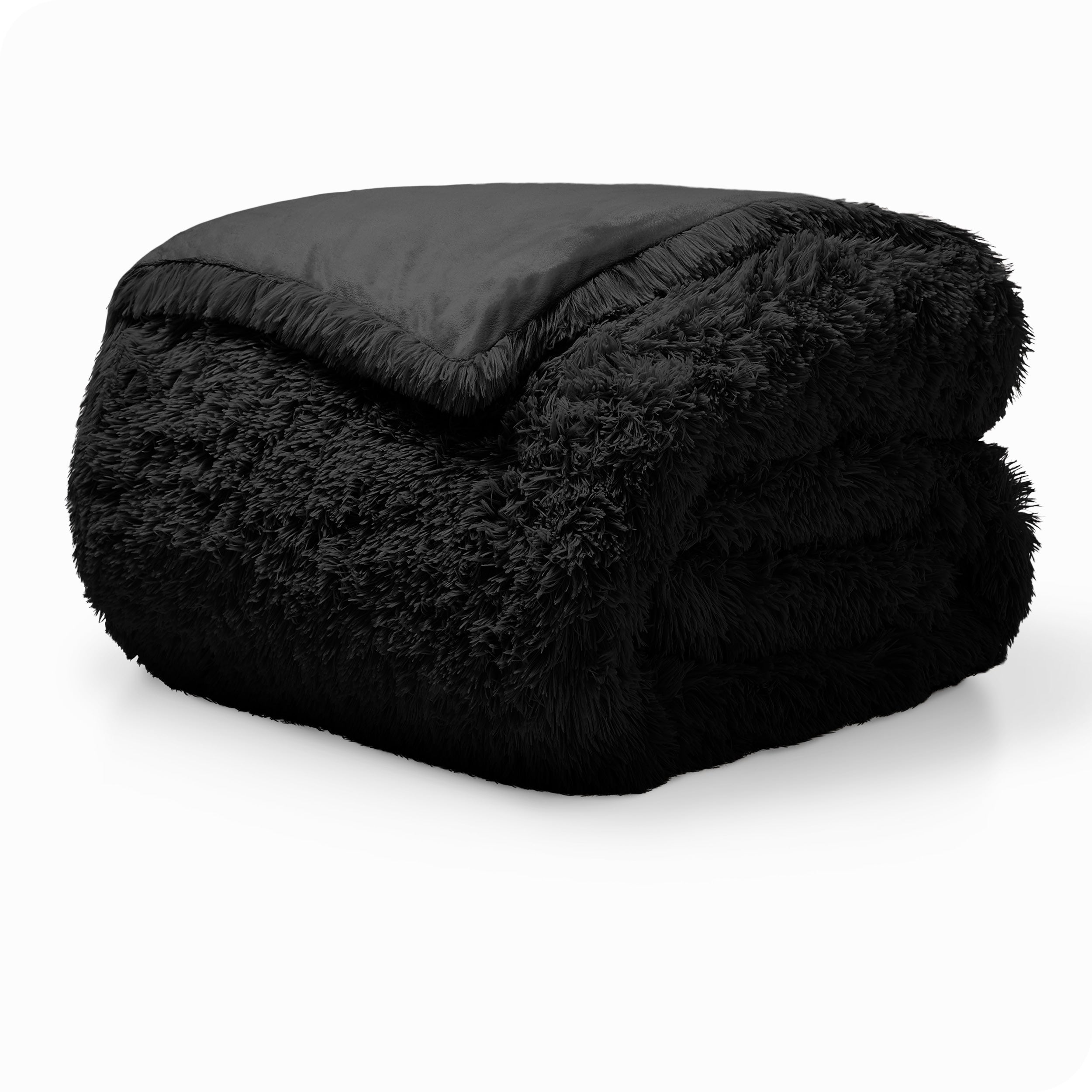 A black shaggy duvet cover folded neatly