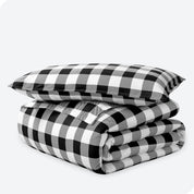 Buffalo plaid print duvet cover and sham set folded and stacked