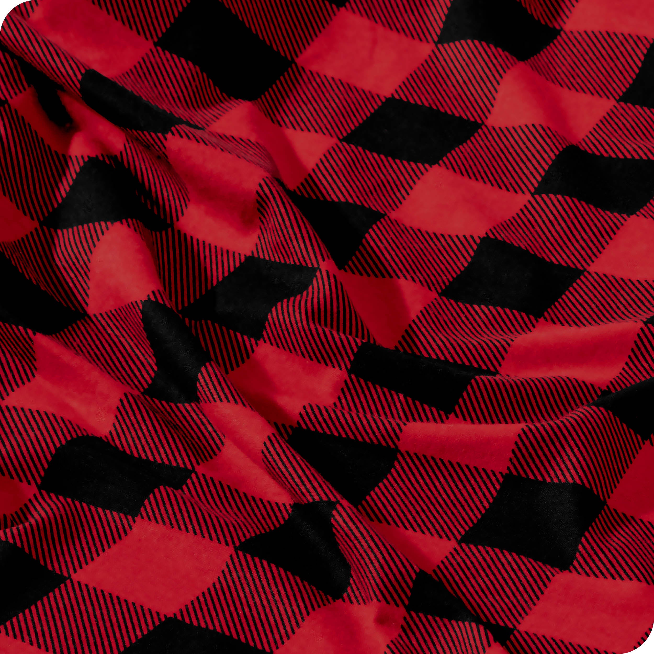 Close up of a plaid sheet showing the print