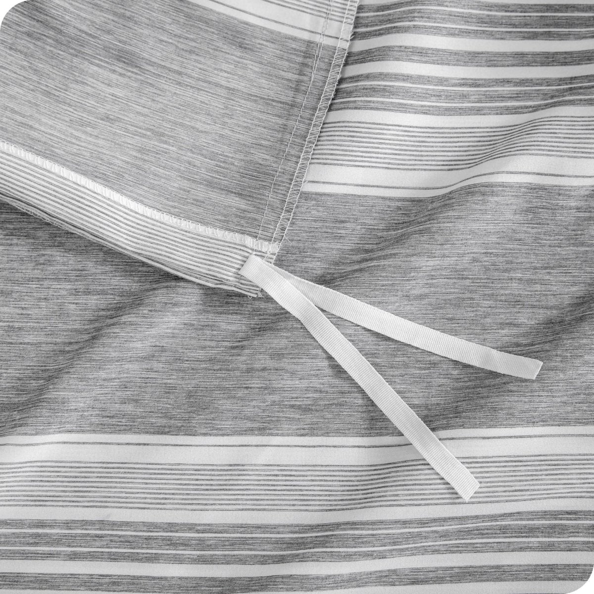 A close view of a printed microfiber duvet cover tie area.