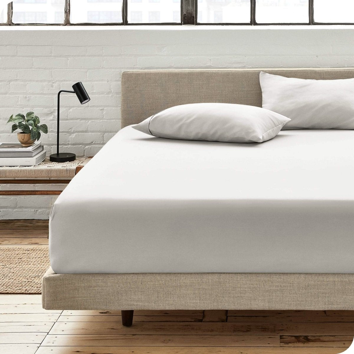 Bedroom with a microfiber fitted sheet on the bed