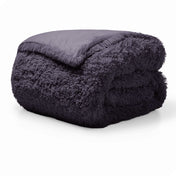 A eggplant shaggy duvet cover folded neatly