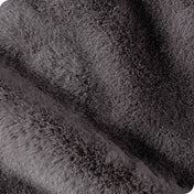 Close up showing the texture of faux fur blanket