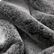 Close up showing the texture of faux fur blanket