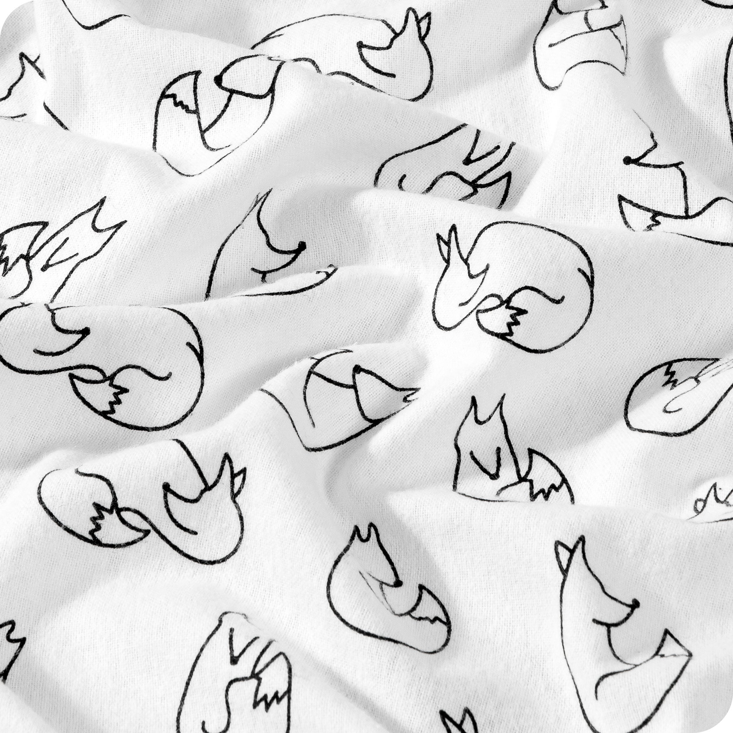 Close up of duvet cover fabric showing the soft texture and fun print