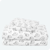 Flannel print sheet set folded and stacked neatly on a white background