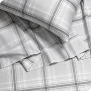 Close up of sheets and pillowcase on a bed