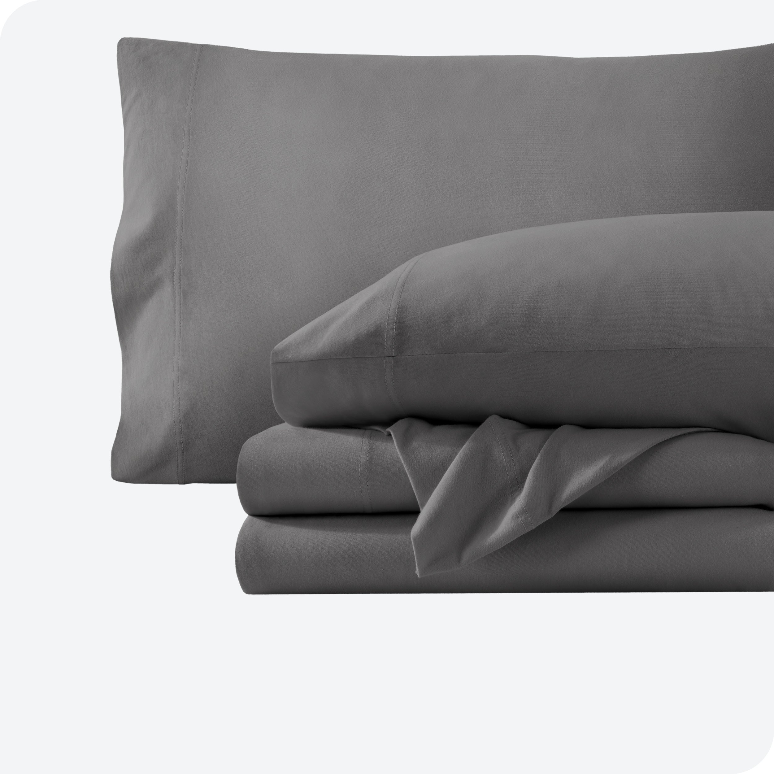 A grey sheet set folded and stacked