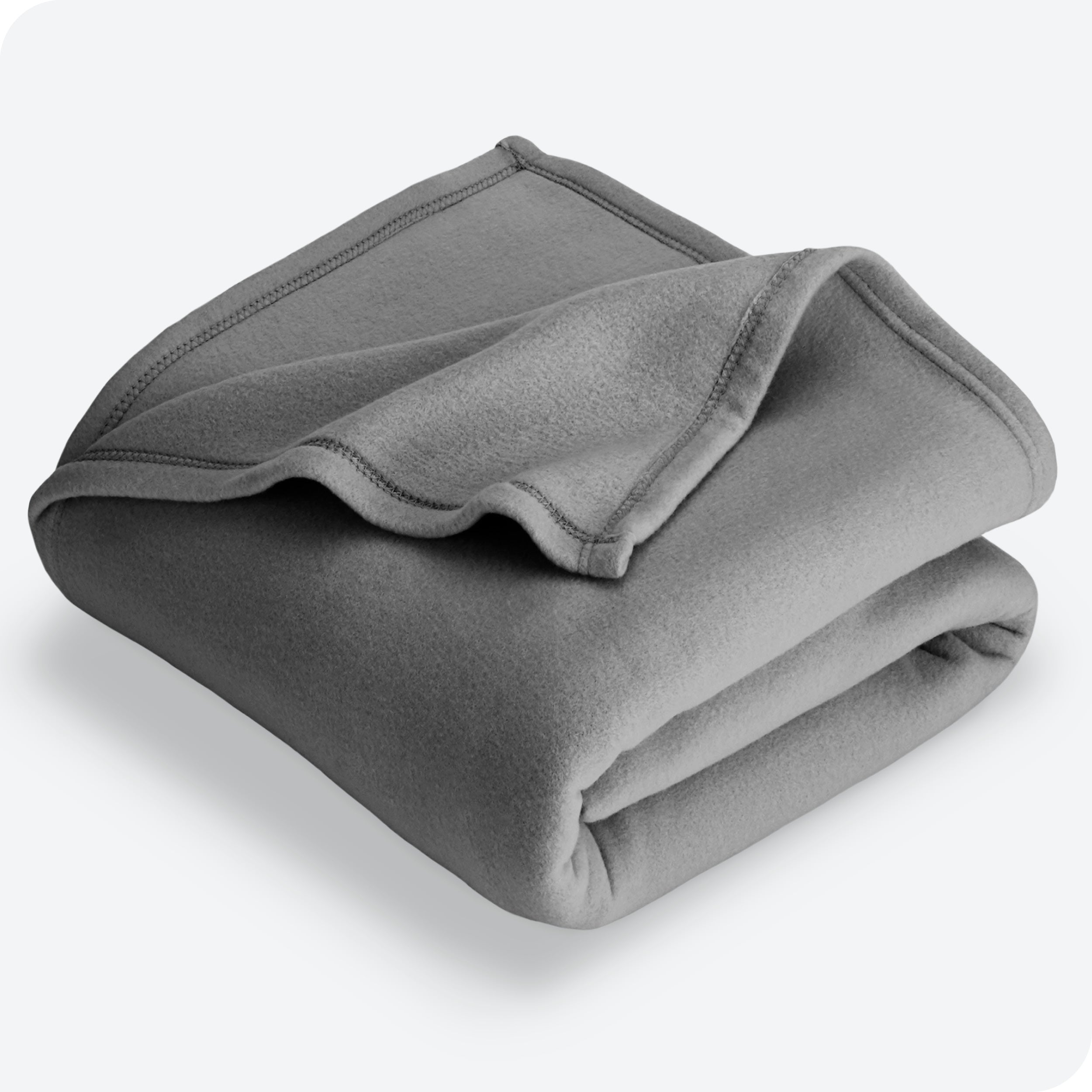 Grey polar fleece blanket folded with 1 corner folded back