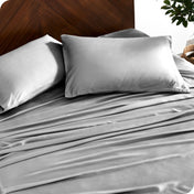 Close up of bamboo sheets and pillowcases on a bed