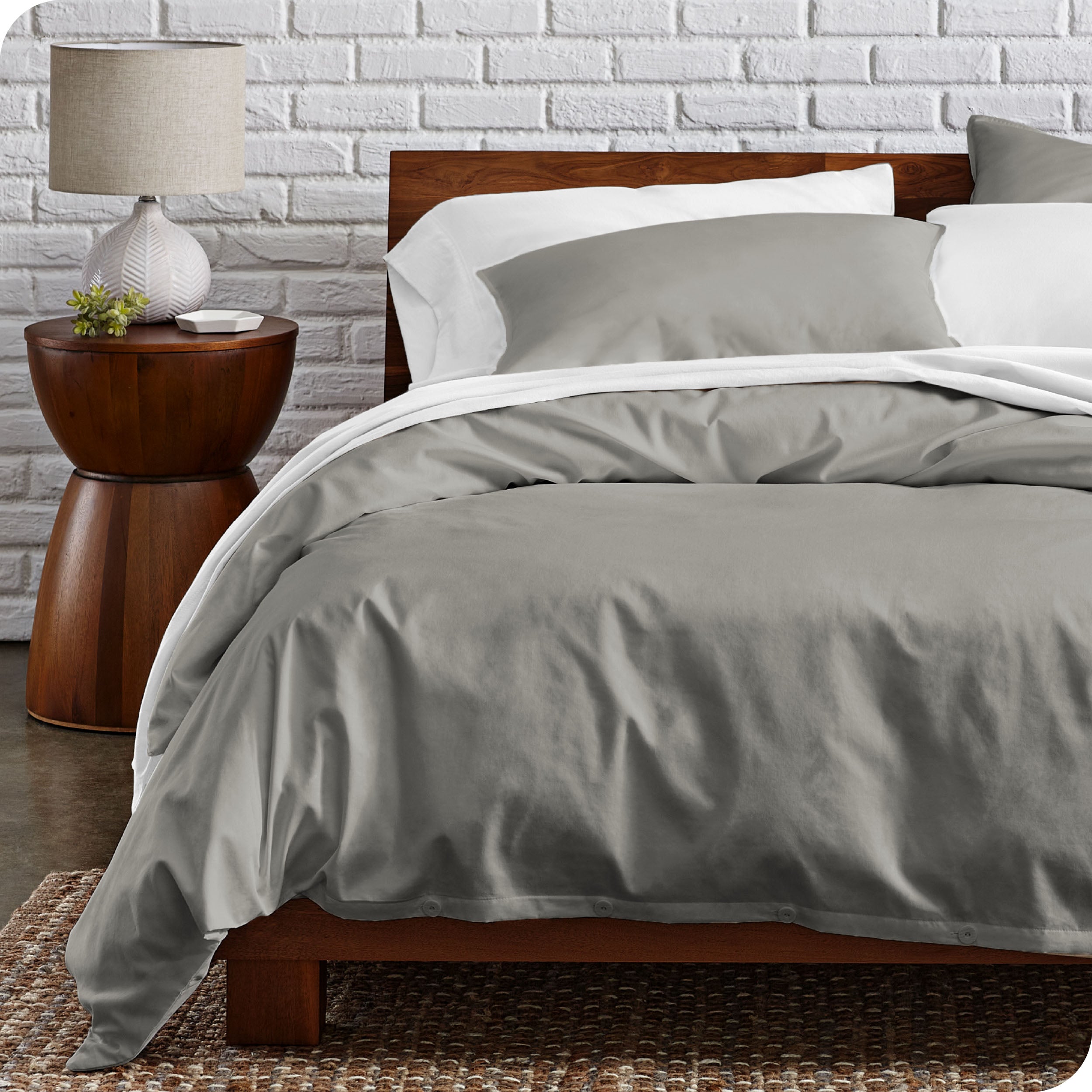 Percale duvet cover set on a bed in a modern bedroom
