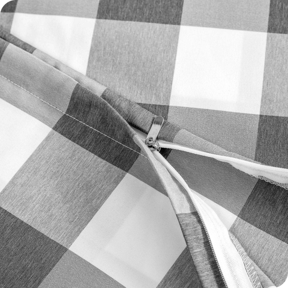 A close up showing a printed microfiber duvet cover zip section.