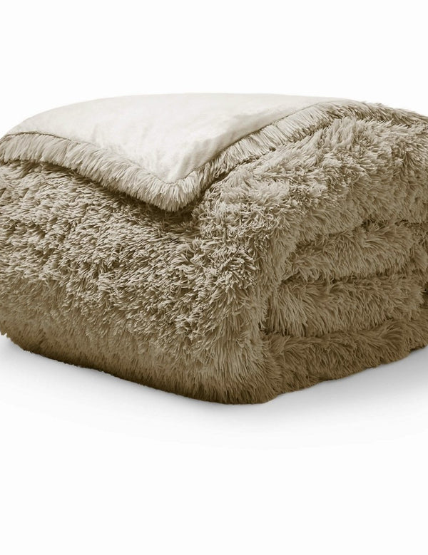 A sand shaggy duvet cover folded neatly